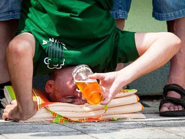 Headstand Beer Drinking